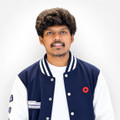 Dinesh M